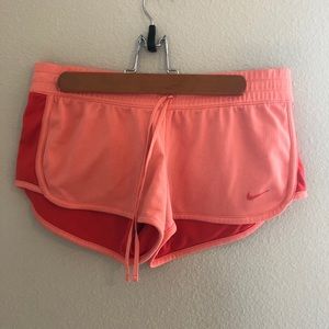 Coral Nike shorts